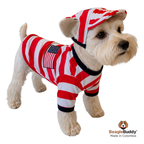 Dog wearing a red, white, and blue outfit with an American flag on a white background